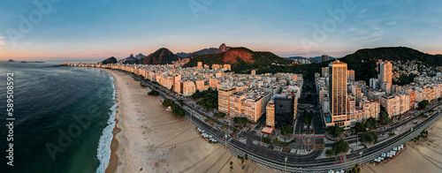 Aerial drone view of Copacabana Beach and urban setting at sunrise, UNESCO World Heritage Site, Rio de Janeiro, Brazil