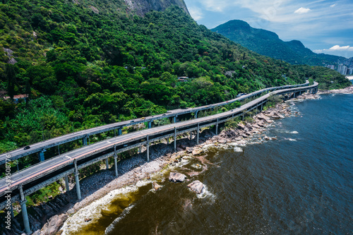 Aerial panoramic view of Elevado do Joa, a complex of tunnels, bridges and viaducts that connects the south and west zones of the city of Rio de Janeiro on the Atlantic coast, Rio de Janeiro, Brazil photo