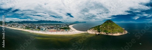 Aerial panoramic view of Pedra do Pontal, which divides Praia de Sernambetiba and Praia do Recreio, Rio de Janeiro, Brazil