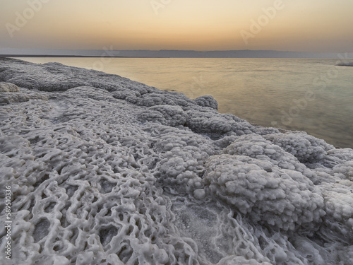 Dry salt incrustations on the shores of the Dead Sea, at dusk, Jordan, Middle East photo