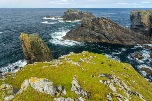 Sea stacks by Butt of Lewis lighthouse, Port of Ness, Island of Harris, Outer Hebrides, Scotland photo
