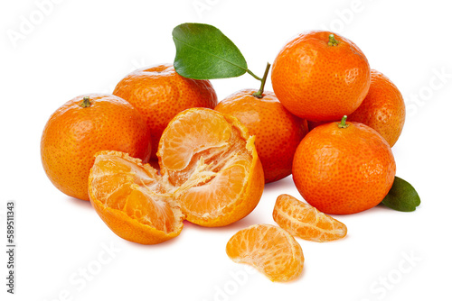 small tangerines or small oranges with leaves on white background. photo