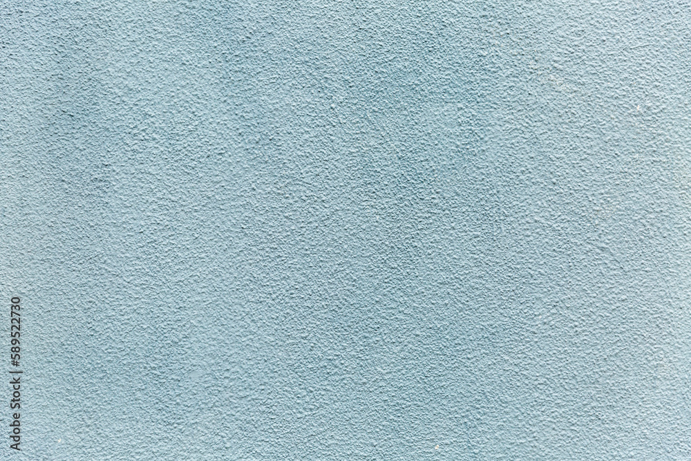 The surface of a dirty painted gray-blue concrete wall. Construction and repair. Space for text. The surface of a dirty painted gray-blue concrete wall. Construction and repair. Space for text.