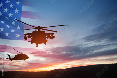 Silhouettes of helicopters on background of sunset with a transparent American flag. Greeting card for Veterans Day, Memorial Day, Air Force Day. USA celebration. photo