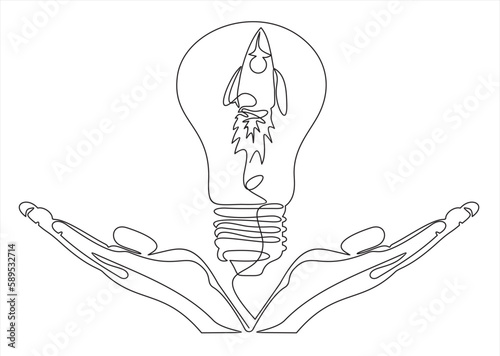 Hands holding a  Rocket launching to space with light bulb, launching a creative idea, a scientific invention or a research light bulb, starting a new business.