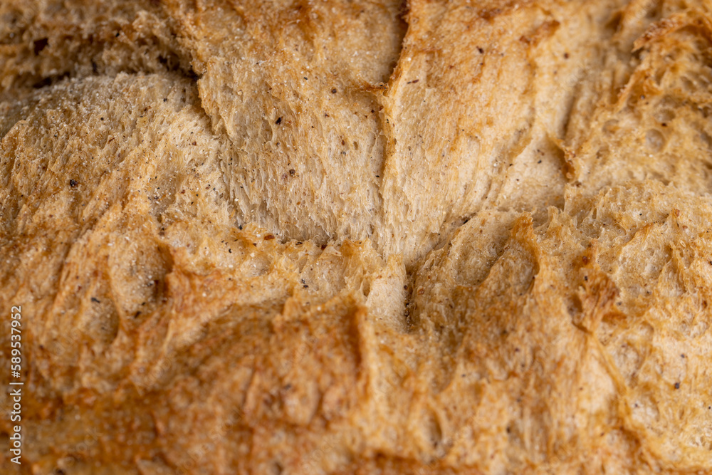 hard crisp crust of a freshly baked loaf of bread hard crisp crust of a freshly baked loaf of bread