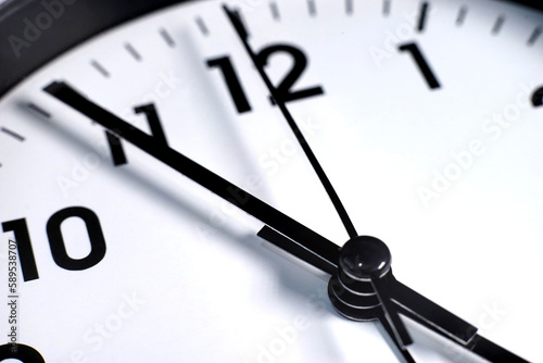 Selective focus of white retro alarm clock or vintage clock. Time is running out concept background