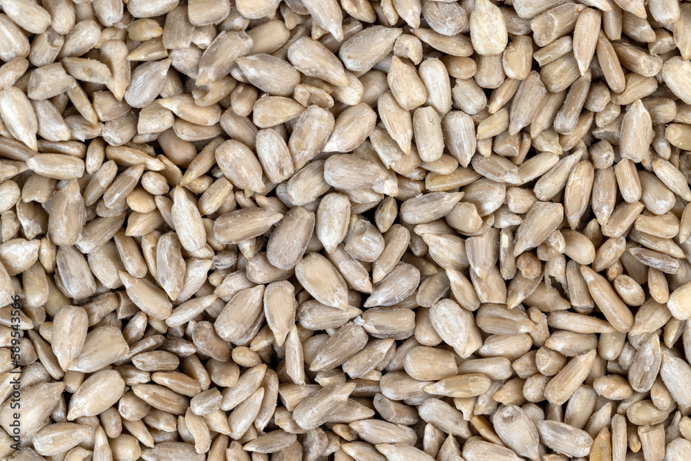 Sunflower seeds peeled from the black shell Sunflower seeds peeled from the black shell