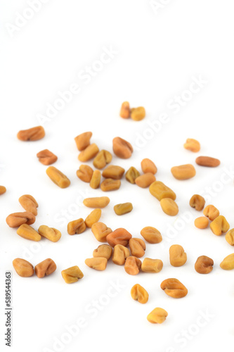Fenugreek seeds isolated on white background