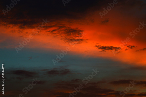 Beautiful sunset sky with clouds. Abstract sky. © Adina