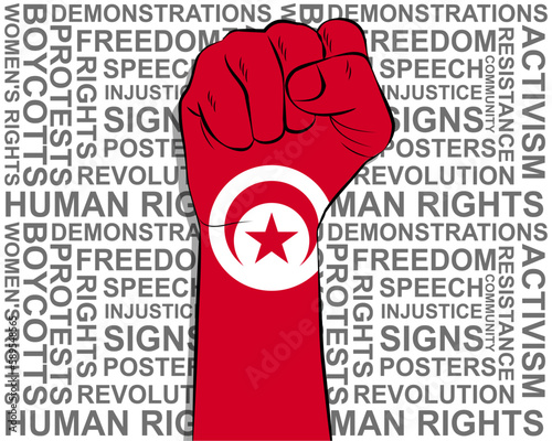 Raised fist on Tunisia flag, political news banner, victory or win concept, freedom symbol