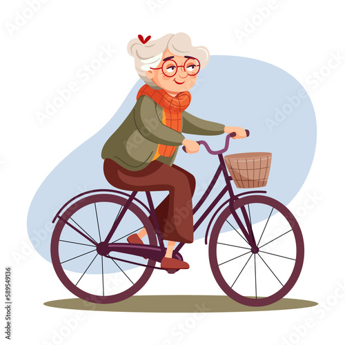 Cute elderly woman rides rides a bicycle