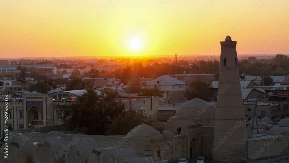 Panorama of the city against the backdrop of sunset