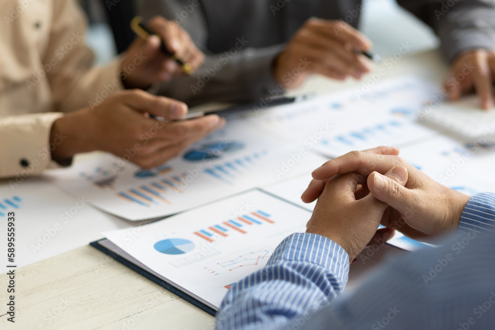 Financial advisory businessman meeting, discuss financial charts in business report and analyze investment plan strategies in the market. Financial advisory businessman meeting, discuss financial charts in business report and analyze investment plan strategies in the market.
