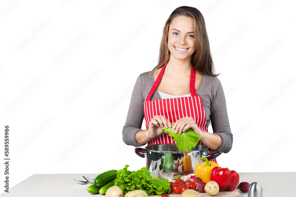 Young beautiful woman Cooking on white background Young beautiful woman Cooking on white background