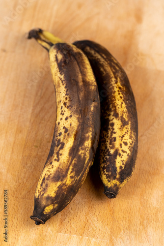 still an edible banana whose peel is covered with black spots
