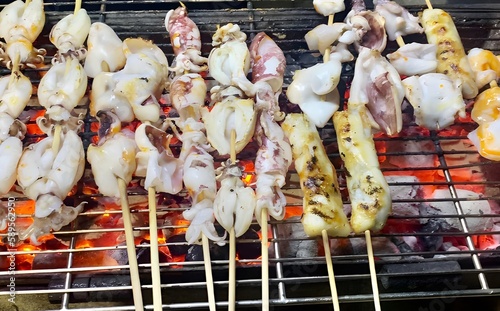 grilled squid skewers on the grill