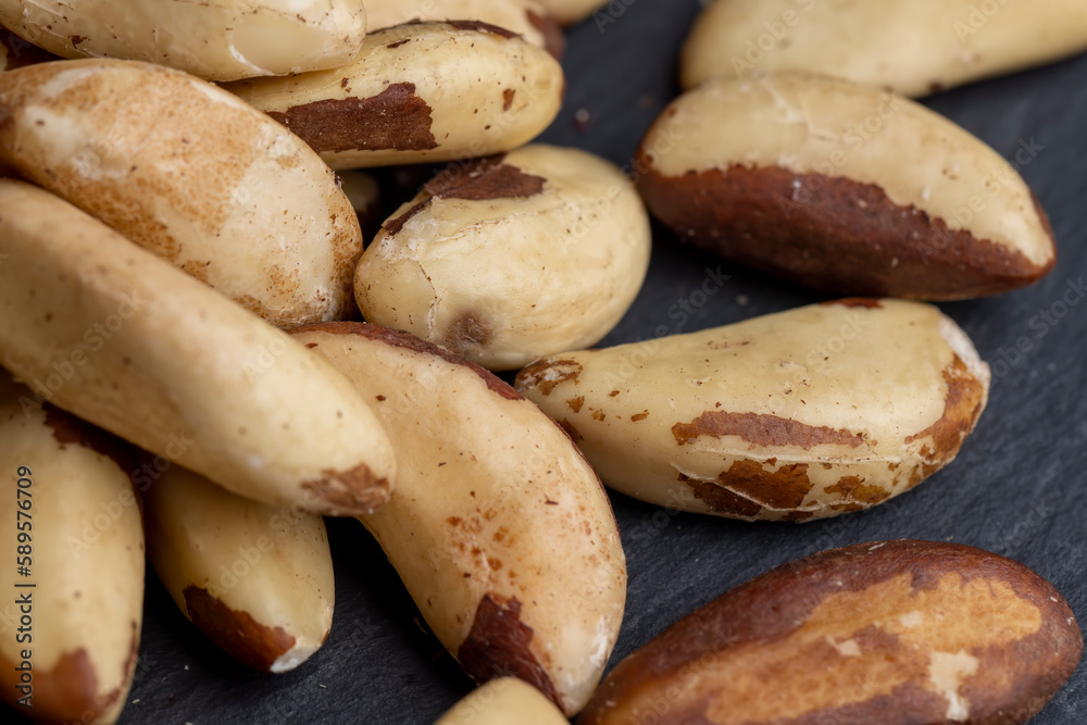 Brazil nuts peeled from the shell on the table Brazil nuts peeled from the shell on the table