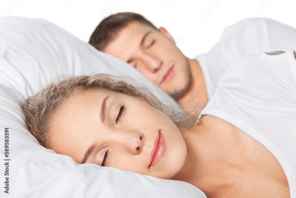Young couple sleeping on the bed in bedroom Young couple sleeping on the bed in bedroom