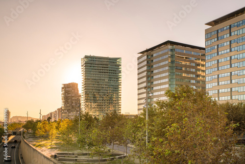 Modern residential  and business buildings at Sant Marti by Passeig de Garcia Faria before sunset photo