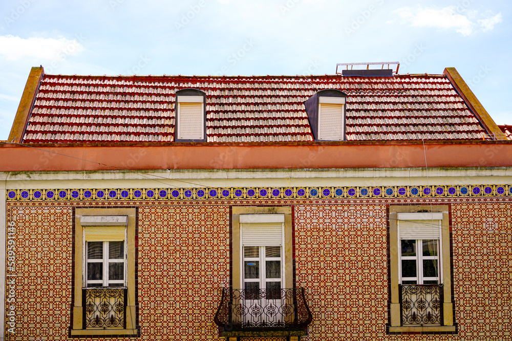 Lisbon house decorated with traditional Portuguese colorful tiles azulejos