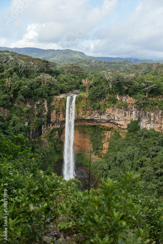 Scenic Chamarel falls in jungle of Mauritius island.