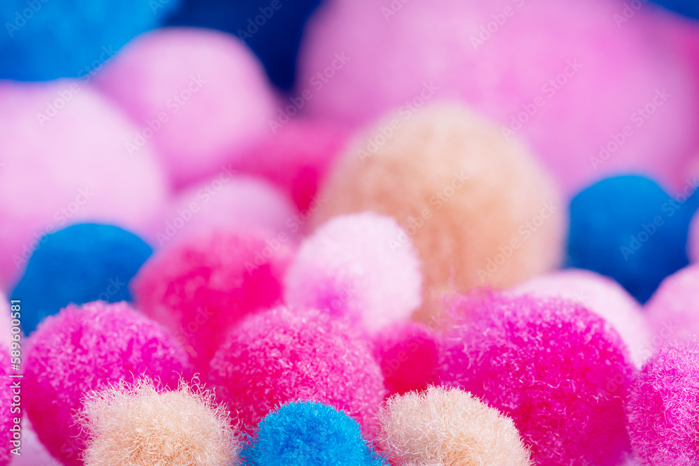 Colorful mini pom poms, pink, blue, beige...Heap of small fluffy ball, macro shot Colorful mini pom poms, pink, blue, beige...Heap of small fluffy ball, macro shot