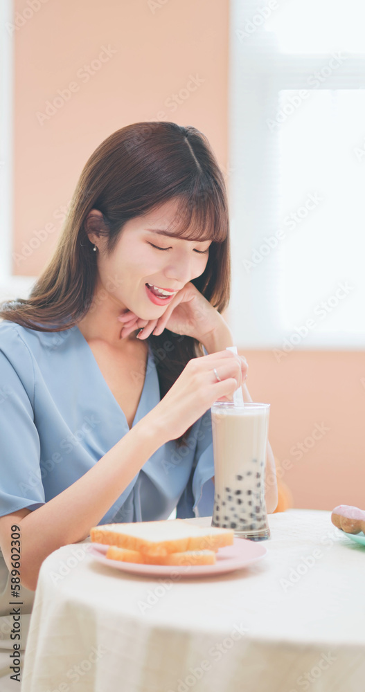 girl drink bubble tea with snacks