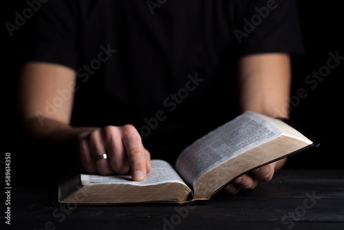 Person reading the Bible, Religion concept