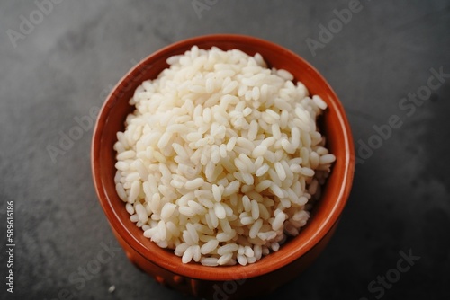 Canvastavla Kerala cooked white boiled rice served in earthen pot, selective focus