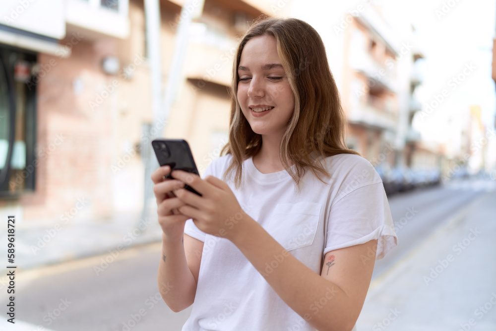 Young caucasian woman smiling confident using smartphone at street Young caucasian woman smiling confident using smartphone at street