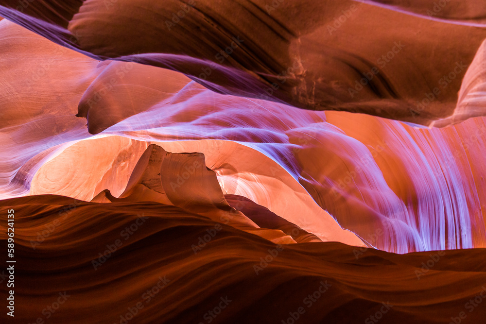Antelope Canyon in the Navajo Reservation Page Northern Arizona. Famous slot canyon. Rock formation, game of lights. Little Monument Valley.