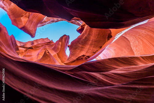 Low angle view of rock formations. Antelope Canyon in the Navajo Reservation Page Northern Arizona. Famous slot canyon. Light showing off the glamorous detail of the ancient spiral rock arches.