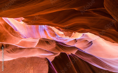 Antelope Canyon in the Navajo Reservation Page Northern Arizona. Famous slot canyon. Rock formation, game of lights.