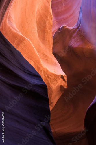 Upper Antelope Canyon in the Navajo Reservation Page Northern Arizona. Famous slot canyon. Light showing off the glamorous detail of the ancient spiral rock arches. Multicolored texture.
