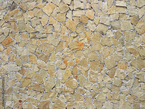the background texture of the wall is finished with a light-colored stone
