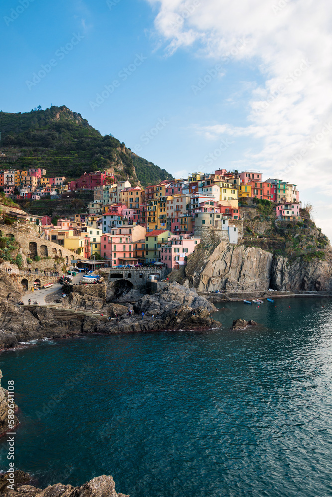 Colorful medieval town on the rocks - Manarola. Cinque Terre National Park in winter. Italian towns.