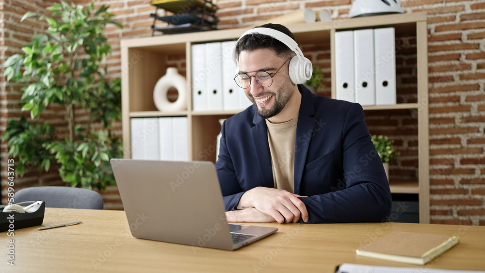 Young arab man business worker having video call at office Young arab man business worker having video call at office