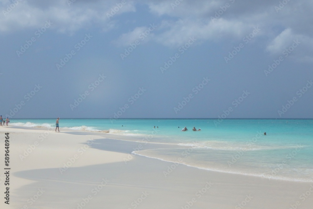 Soft silky white sand  and clear turquoise waters of Eagle Beach Aruba