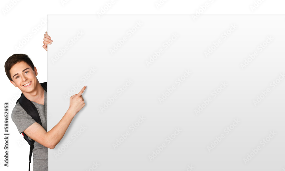 Smiling student boy with blank card Smiling student boy with blank card