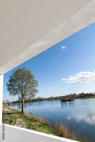 Abstract horizontal view of Tychero lake in Soufli region Evros Greece blue sky and water reflection, springtime photo