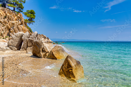 Fototapeta Naklejka Na Ścianę i Meble -  View on calm Fava sand beach near Vourvourou, Greek peninsula Sithonia, Chalkidiki