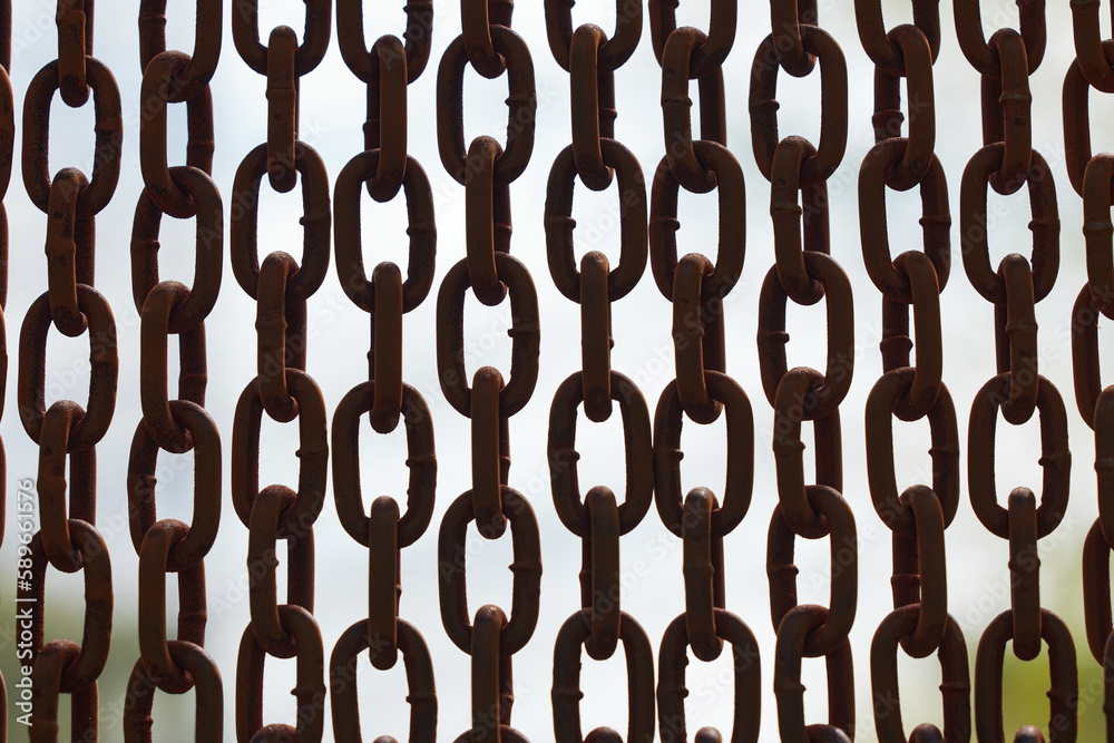 Rusty chains. Background of chains on a withe background. Rust Anchor Chain. Curtain of old chain-link. Background of metal chains, old used chain