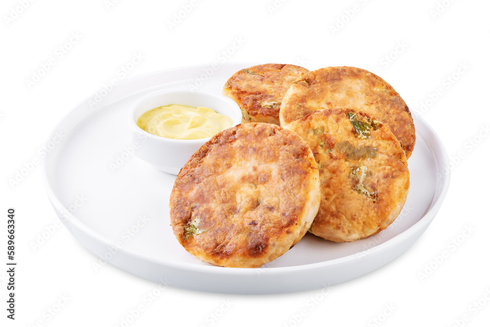 Salmon potato cakes on a white isolated background Salmon potato cakes on a white isolated background