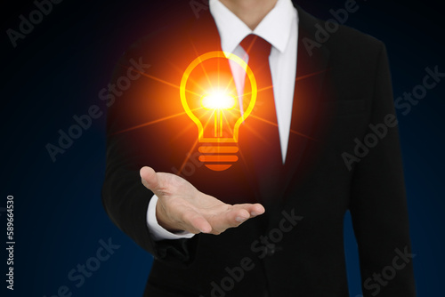 Businessman with Light Bulb on His Hand