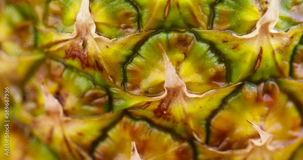 one ripe pineapple close-up, peeled pineapple peel green and yellow one ripe pineapple close-up, peeled pineapple peel green and yellow