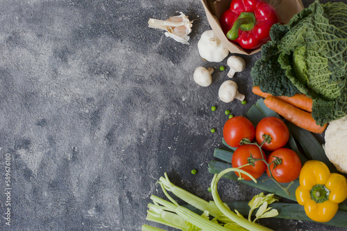 various vegetables over grey stone background