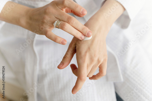 healthy body care concept. ecological cream applied on the hands. dermatology.