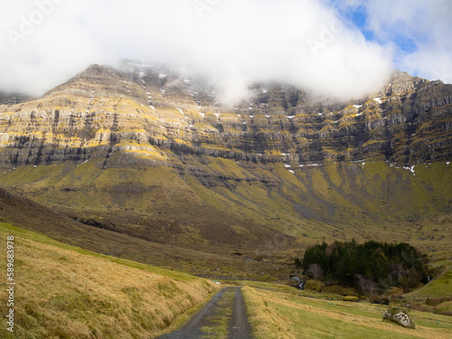 Kunoy park below Urðafjall mountain photo