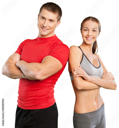 Young sportive couple on white background